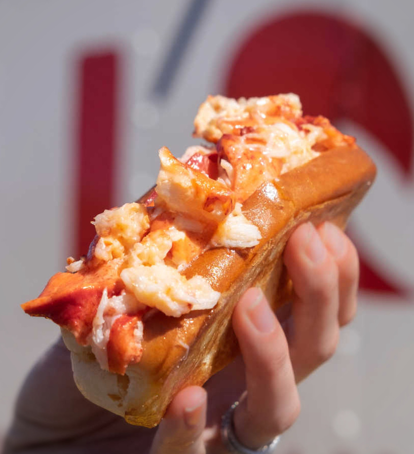 Holding Warm Lobster Roll with Butter